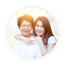 caregiver and elderly woman smiling
