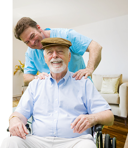 caregiver and elderly man in a wheelchair
